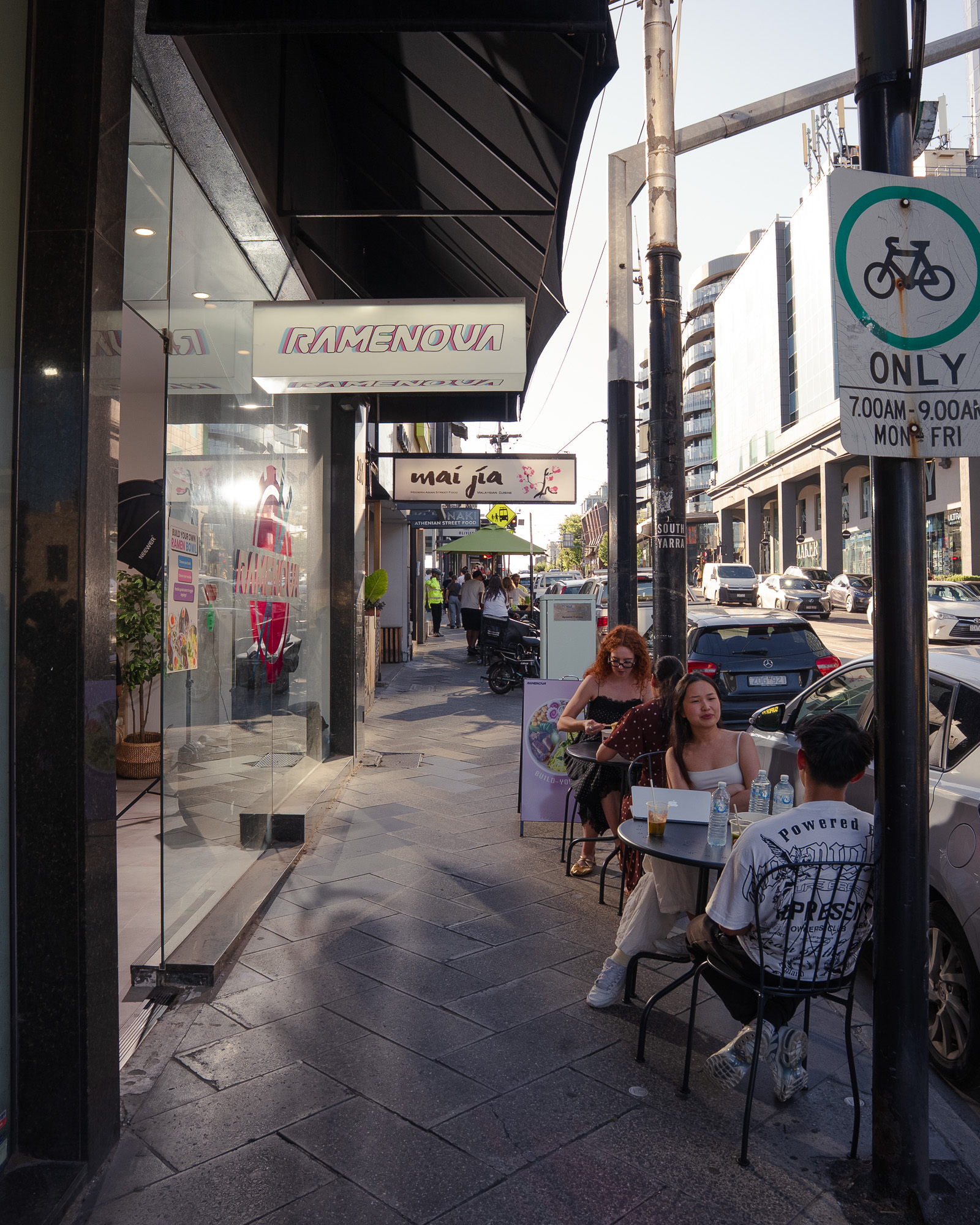 Ramenova shopfront on Toorak Road, South Yarra, with street tables out the front